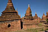 The cluster of red brick temples, named Khay-min-gha on the map on the North plain of Bagan. Myanmar. 